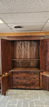 Load image into Gallery viewer, Tall Large Dark Walnut Ornate Carved Front Motif Armoire Cabinet 20th Century
